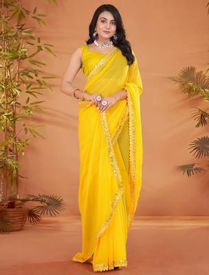 Yellow embellished georgette saree with matching blouse 3