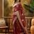 Maroon woven design banarasi saree with blouse piece