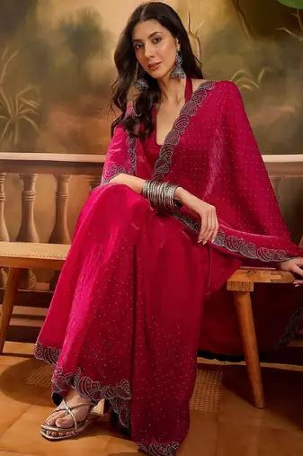Magenta embellished saree with unstitched blouse