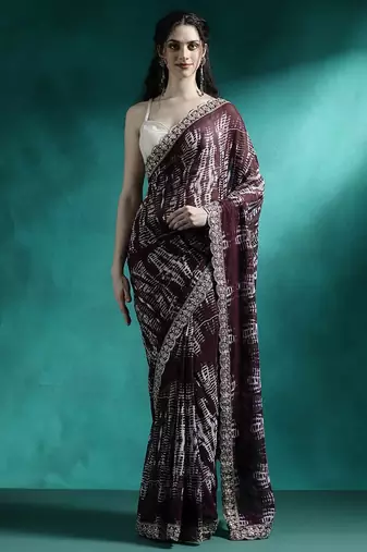 Brown tie and dye printed sequinned embroidered sarees