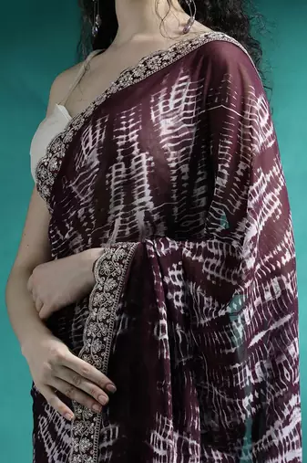 Brown tie and dye printed sequinned embroidered sarees