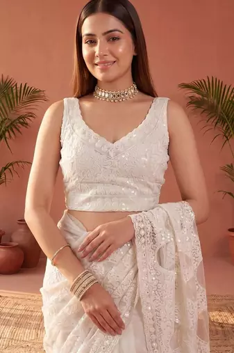 Off white sequinned net designer saree