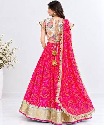 Off white embroidered choli with coral bandhej lehenga set 2