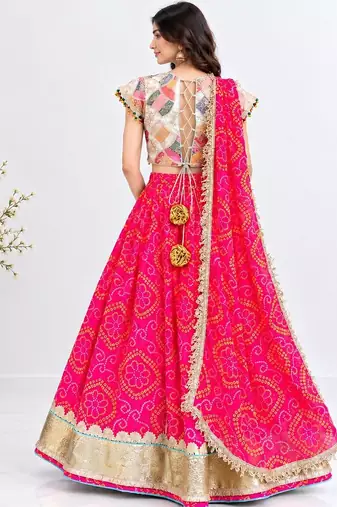 Off white embroidered choli with coral bandhej lehenga set