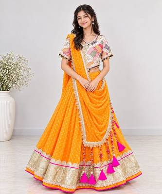 Off white embroidered choli with orange bandhej lehenga set 1