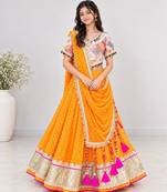 Off white embroidered choli with orange bandhej lehenga set
