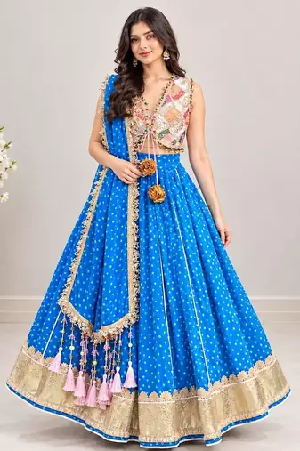 Off white embroidered choli with blue bandhej lehenga set