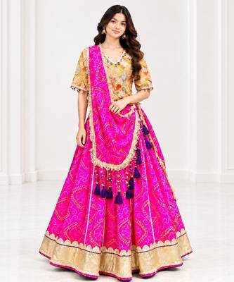Mustard embroidered choli with pink bandhej lehenga set 1