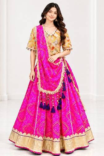 Mustard embroidered choli with pink bandhej lehenga set