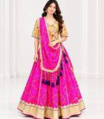 Mustard embroidered choli with pink bandhej lehenga set