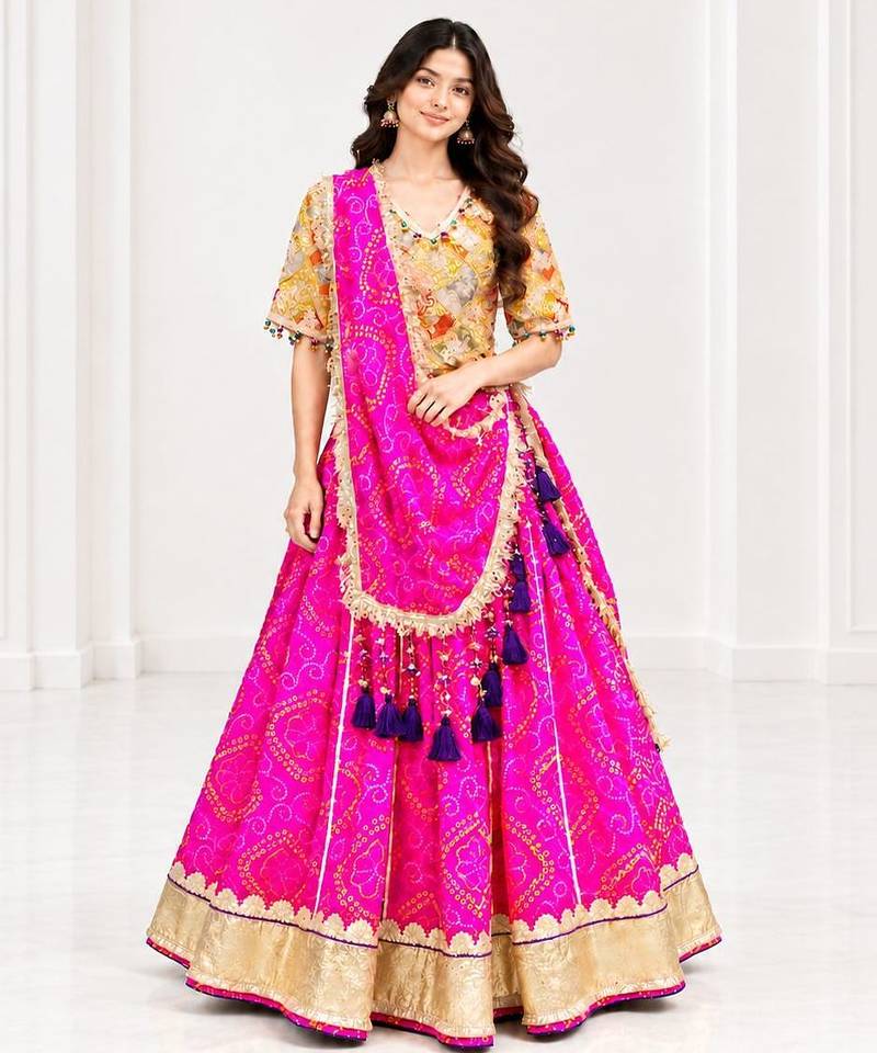 Mustard embroidered choli with pink bandhej lehenga set