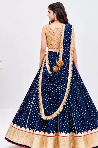 Mustard embroidered choli with royal blue bandhej lehenga set