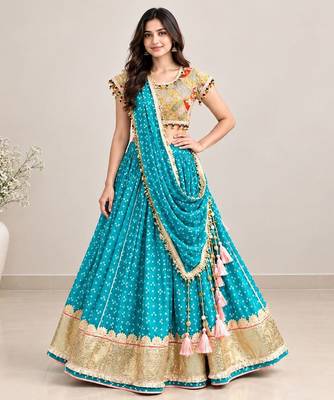Mustard embroidered choli with aqua green bandhej lehenga set 1