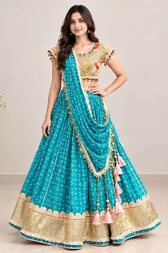 Mustard embroidered choli with aqua green bandhej lehenga set