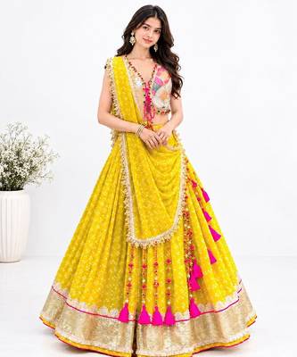 Off white embroidered choli with yellow bandhej lehenga set 1