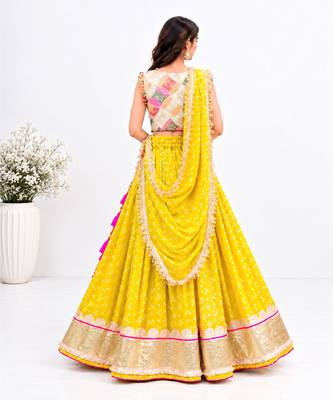 Off white embroidered choli with yellow bandhej lehenga set 2