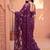 Purple sequinned net designer saree