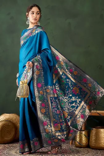 Teal woven design banarasi saree with blouse piece