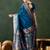 Teal woven design banarasi saree with blouse piece