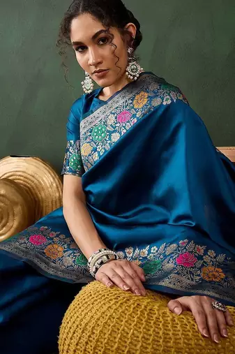 Teal woven design banarasi saree with blouse piece