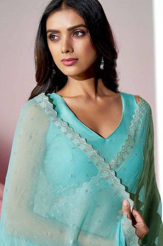 Sea green embellished shimmer saree with blouse piece
