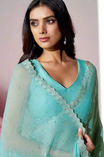 Sea green embellished shimmer saree with blouse piece