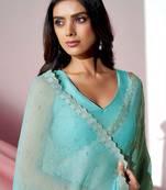 Sea green embellished shimmer saree with blouse piece