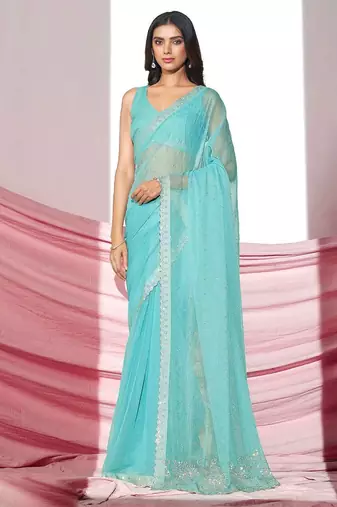 Sea green embellished shimmer saree with blouse piece