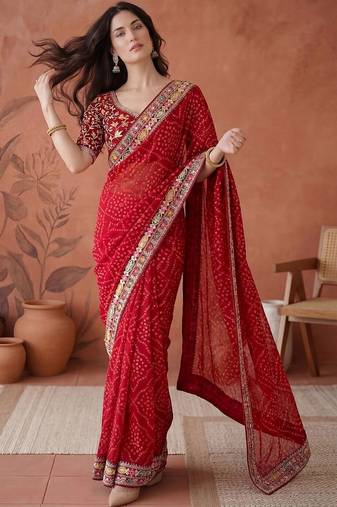 Red bandhani printed festive wear sarees with unstitched blouse piece