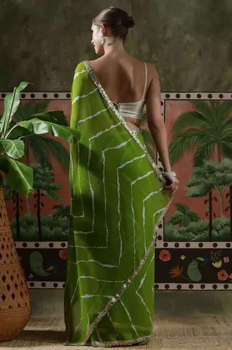 Green embellished embroidered laheriya printed georgette ready to wear saree