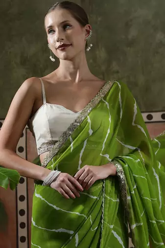 Green embellished embroidered laheriya printed georgette ready to wear saree