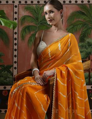 Yellow embellished embroidered laheriya printed georgette ready to wear saree 4