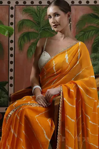 Yellow embellished embroidered laheriya printed georgette ready to wear saree