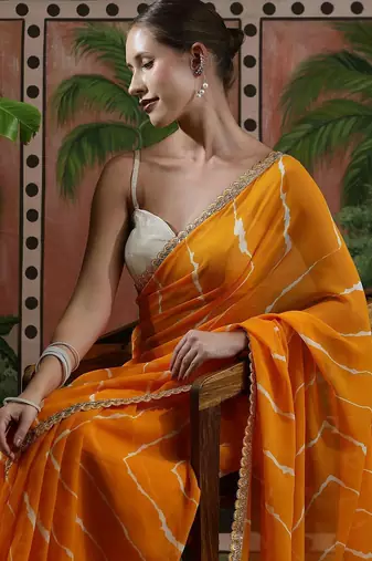 Yellow embellished embroidered laheriya printed georgette ready to wear saree