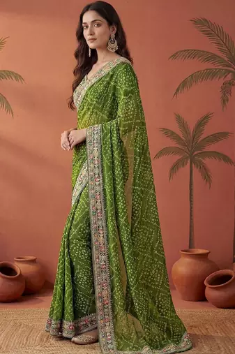 Green bandhani printed festive wear sarees with unstitched blouse piece