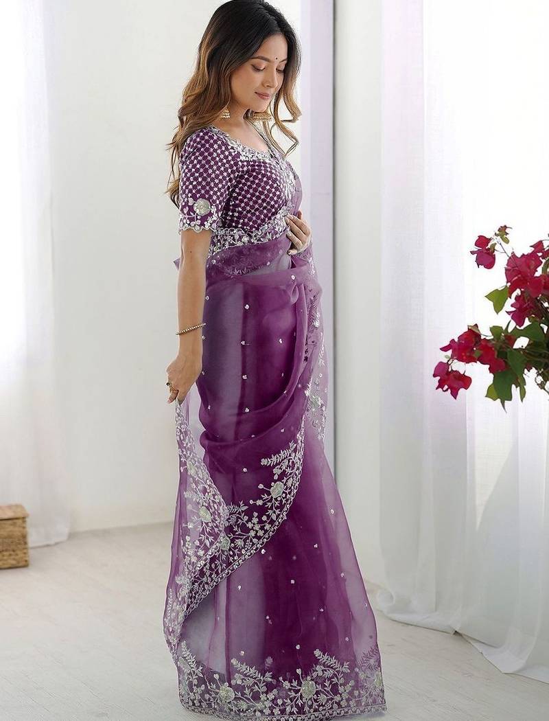 Purple embroidered saree with unstitched blouse piece
