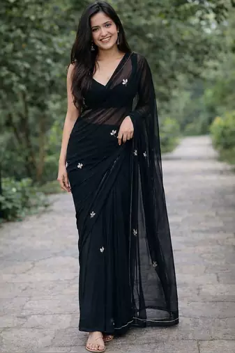 Black solid georgette hand-embroidered floral buttis salli work border sarees