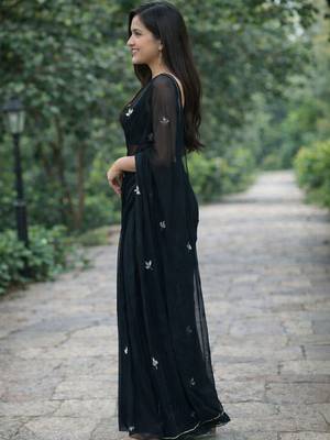 Black solid georgette hand-embroidered floral buttis salli work border sarees 3