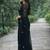Black solid georgette hand-embroidered floral buttis salli work border sarees