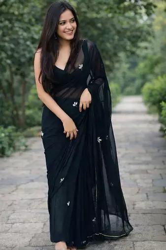 Black solid georgette hand-embroidered floral buttis salli work border sarees