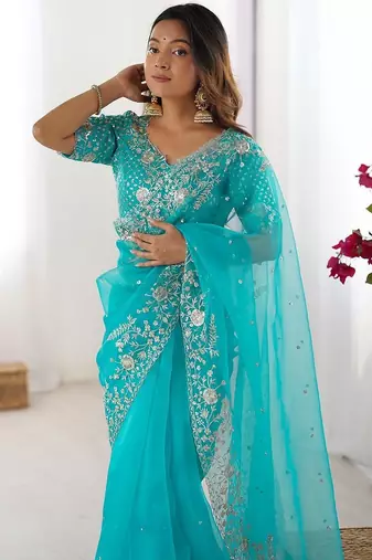Blue organza sequin embroideried blouse piece & sarees