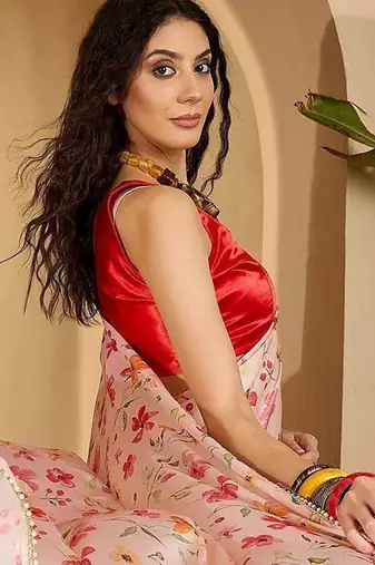 Peach floral printed saree with embellished beads and stones border
