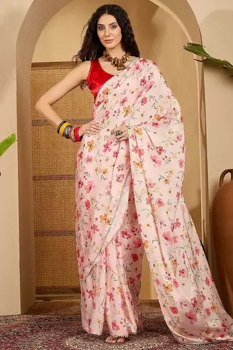 Peach floral printed saree with embellished beads and stones border