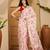 Peach floral printed saree with embellished beads and stones border