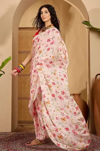 Peach floral printed saree with embellished beads and stones border