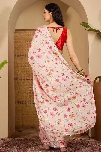 Peach floral printed saree with embellished beads and stones border