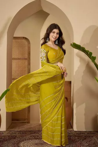 Yellow embellished beads and stones saree