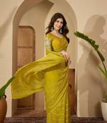 Yellow embellished beads and stones saree