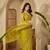 Yellow embellished beads and stones saree