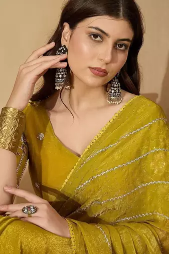 Yellow embellished beads and stones saree